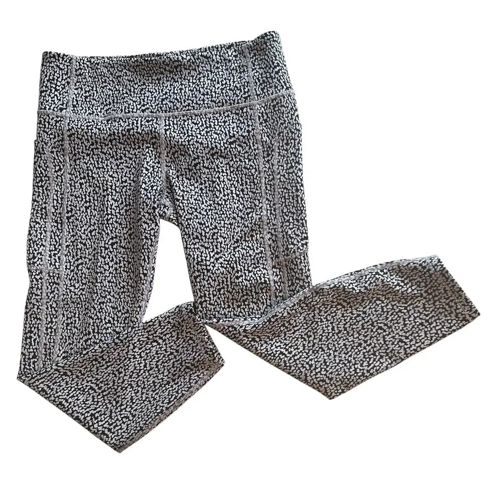 Athleta Ultimate Stash Textured 7/8 Leggings Womens Large Camilla Water Violet